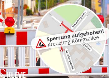 Ein Bild eines Bauzaunes, davor ein Kartenausschnitt der Kreuzung Königsallee / Bresserbergstraße / Annabergstraße und der Schriftzug "Sperrung aufgehoben Kreuzung Königsallee"